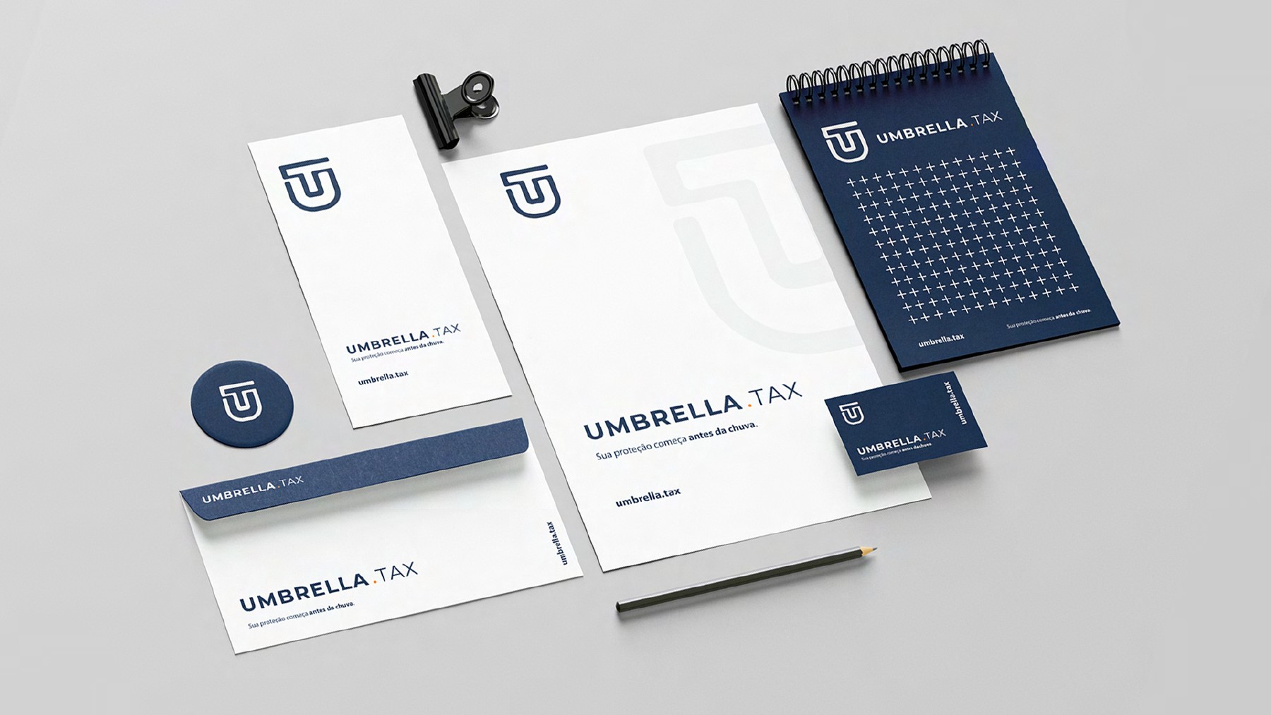 Papelaria e materiais de marca da Umbrella Tax